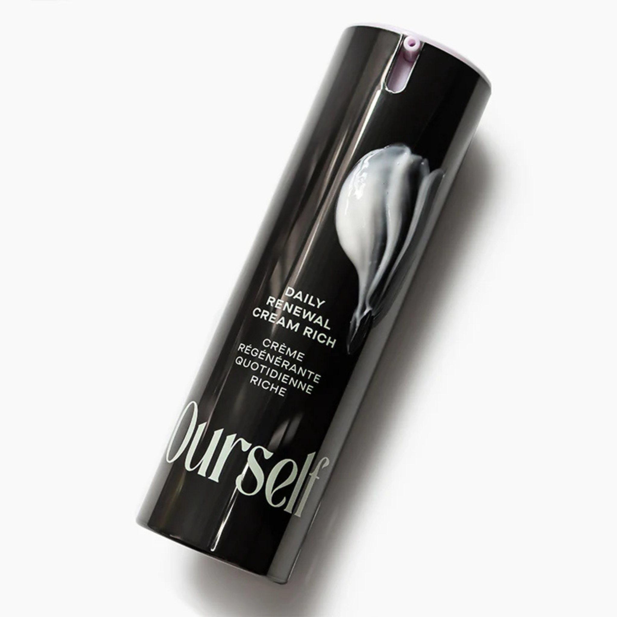 Skincare cream tube labeled 'Daily Renewal Cream Rich' by 'Ourself' on a white background